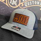 Station hat with traditional flag leather patch