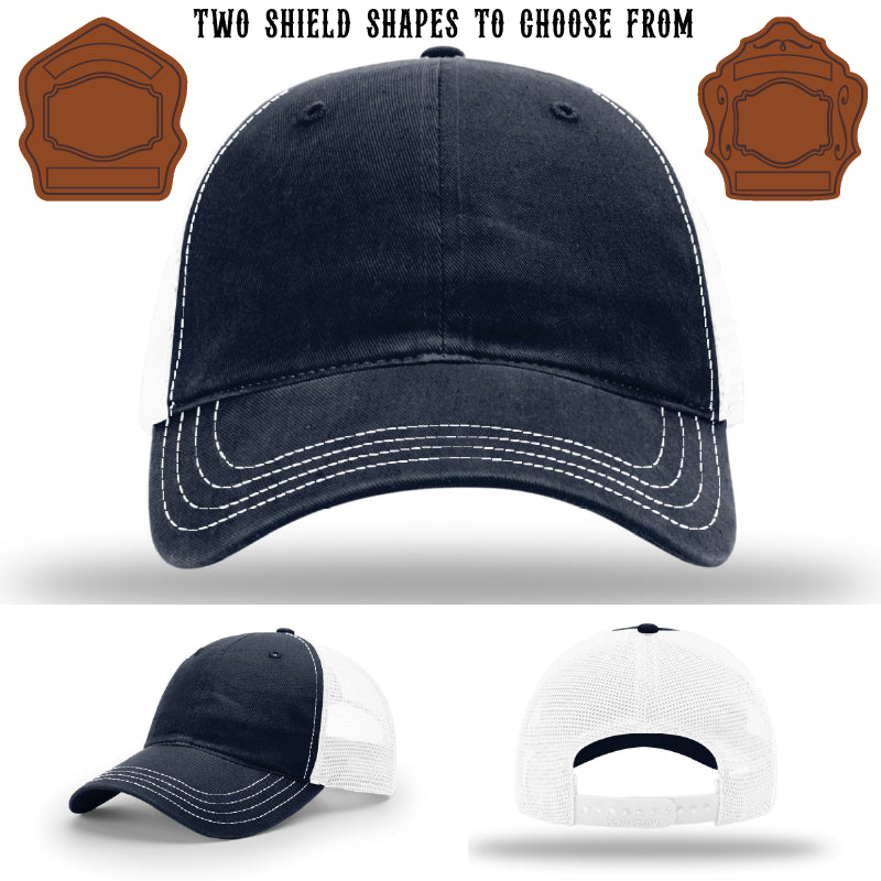Firefighter hat displaying two traditional shield patch styles