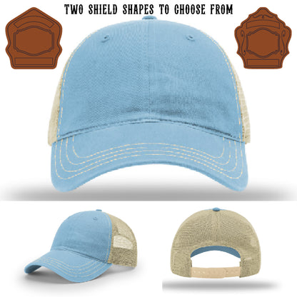 Firefighter hat with two leather shield patch examples