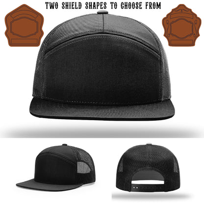 Fire department hat featuring two leather shield patch examples