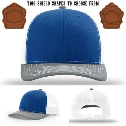 Firefighter hat showing two shield patch style variations