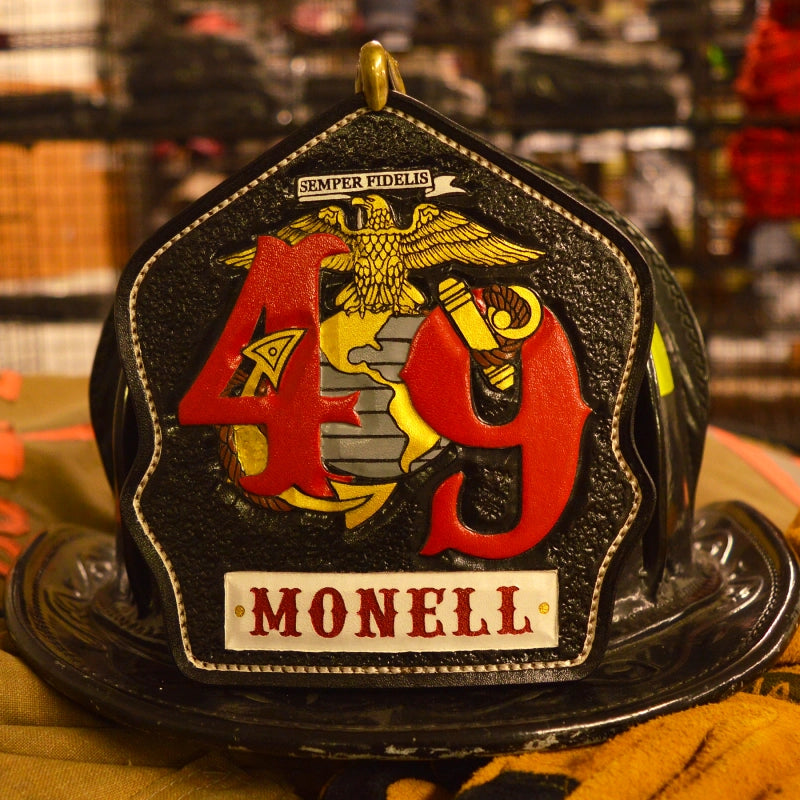 firefighter helmet shield built from custom leather artwork