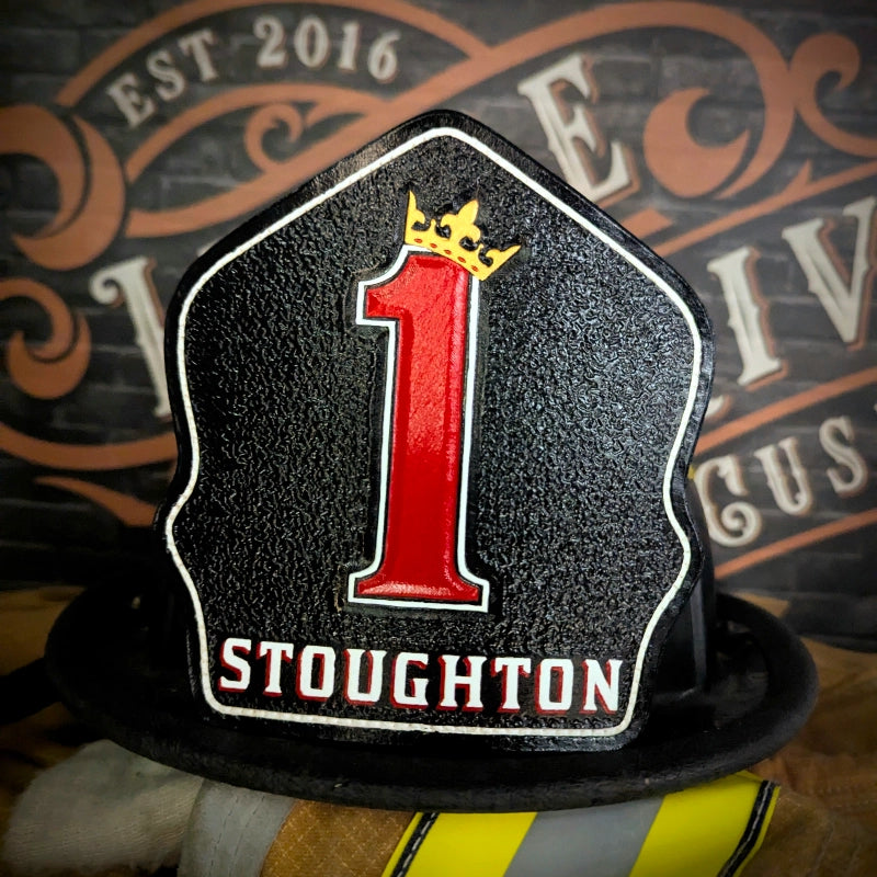 custom leather helmet shield designed for firehouse identity