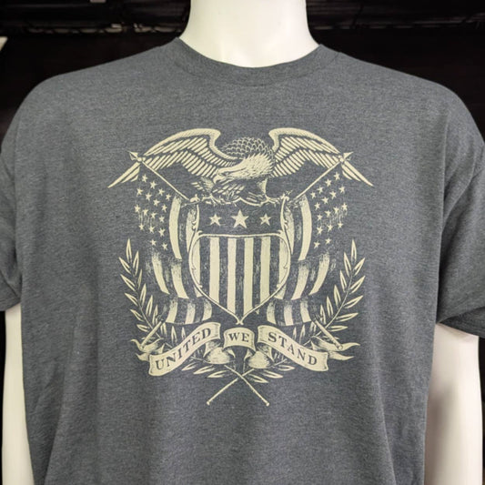 Dark gray t-shirt with vintage eagle and shield crest and “United We Stand” banner – patriotic graphic tee for American pride and unity
