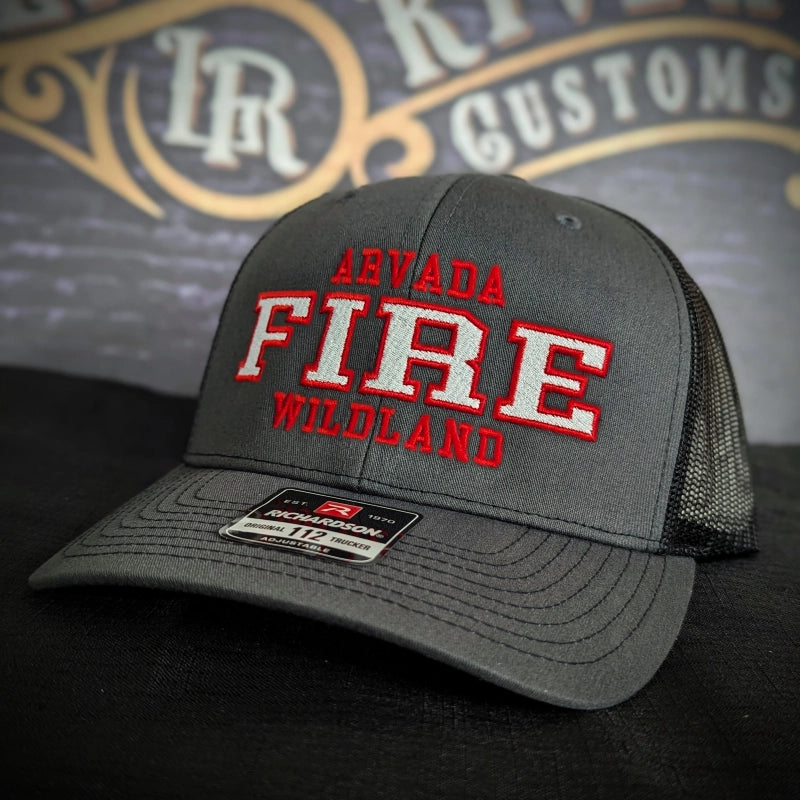 firefighter hat featuring detailed embroidered department emblem
