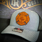 Firefighter hat with Maltese Cross leather badge