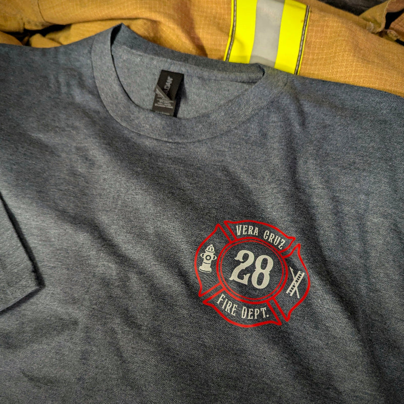 Firefighter T-shirt with custom department logo design in gray fabric.