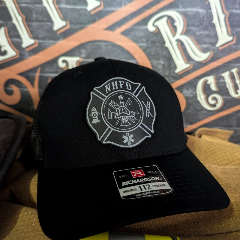 Custom firefighter hat showcasing full color Maltese Cross patch