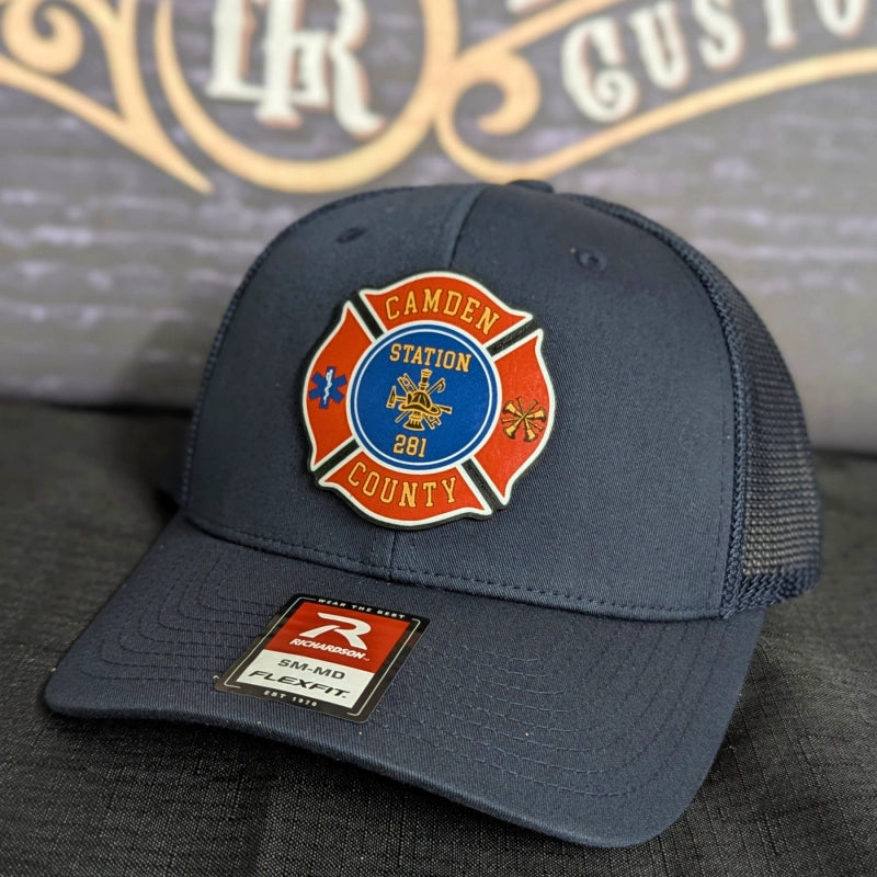 Firefighter hat showcasing full color Maltese Cross leather patch