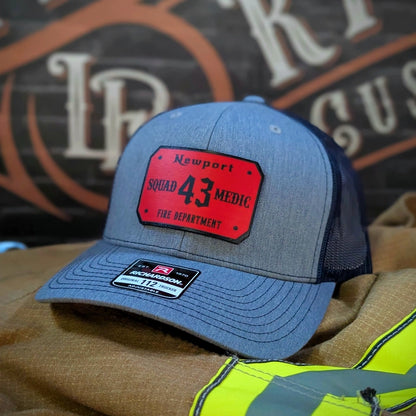 Custom firefighter hat featuring detailed passport patch