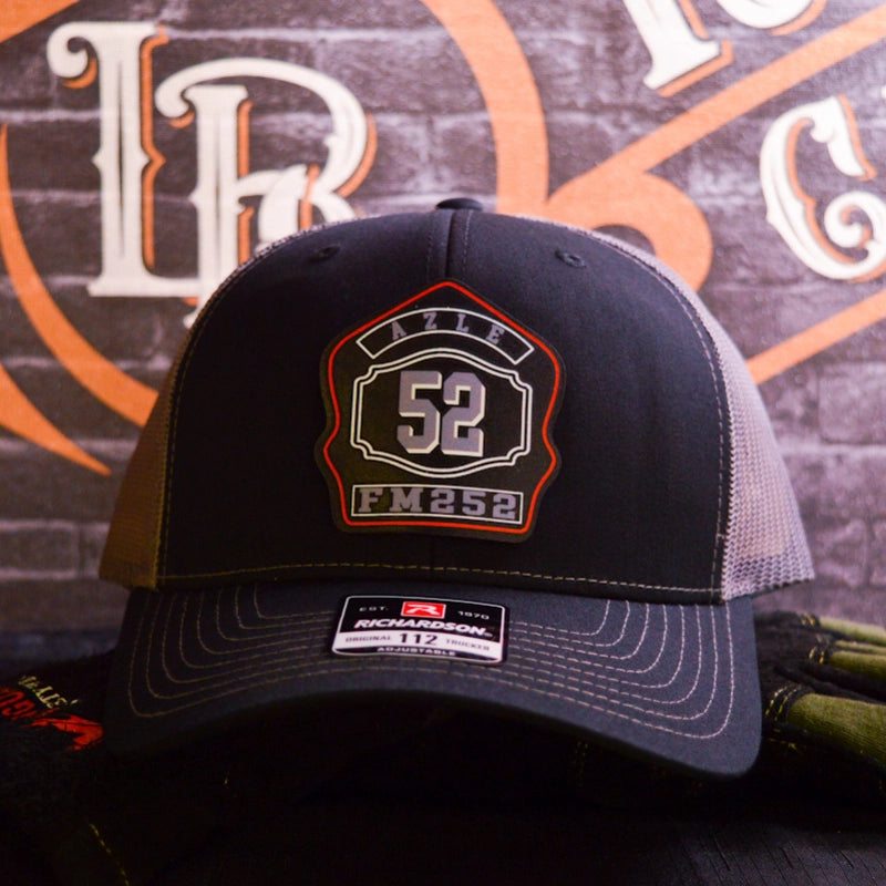 Firefighter hat showcasing full color leather shield patch