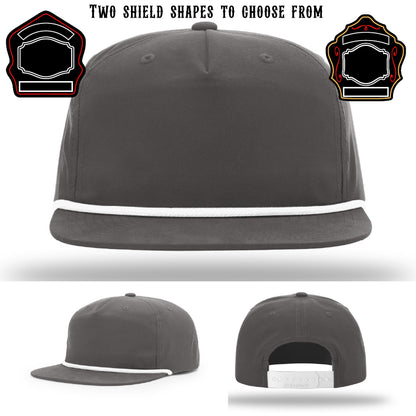 Station hat with two custom firefighter shield patch examples