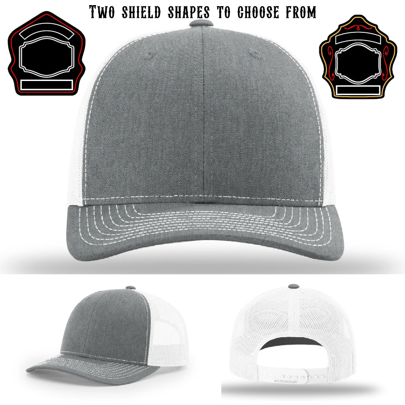 Fire department hat displayed with two shield patch examples