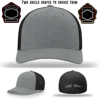 Firehouse hat displayed with two firefighter shield patches