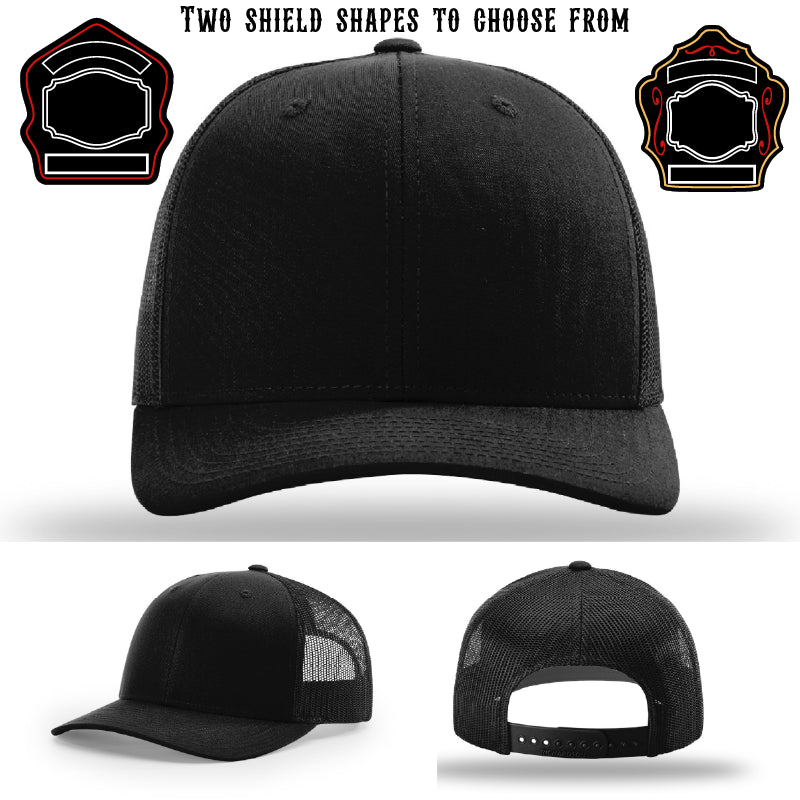 Station hat displayed with two firefighter shield patch shapes
