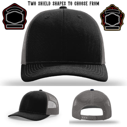 Fire department hat showing two shield patch design options