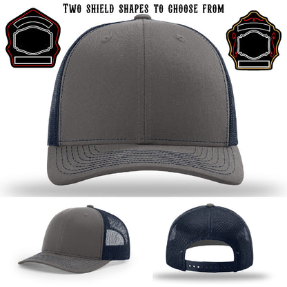 Firefighter hat displayed with two shield patch variations