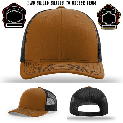 Station hat showing two examples of shield patch designs