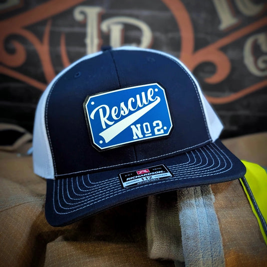 Firefighter hat featuring passport style leather patch in vivid color
