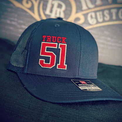 Custom embroidered firefighter hat with bold stitching, structured fit, and premium Richardson snapback design