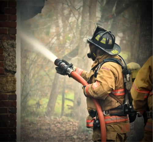 Little River Customs about page image showing firefighter roots and custom gear story