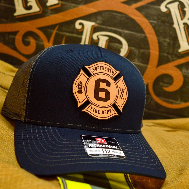 Leather Maltese Cross patch on firefighter hat