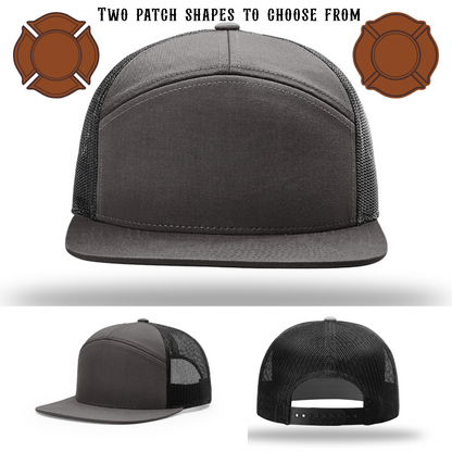 Firefighter hat displayed blank with two leather patch shapes