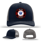 Firefighter hat displayed with Maltese Cross leather patch