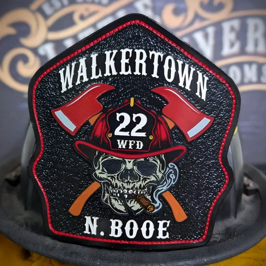 Ole Salty custom firefighter helmet shield with skull and axes design