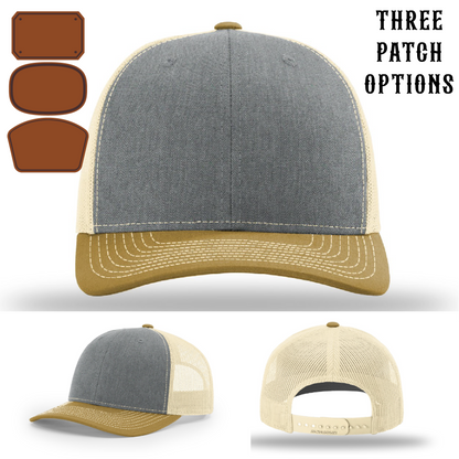 Station pride hat with three front facing passport leather patch options