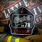 Handcrafted leather firefighter helmet shield in passport style with clean firehouse layout