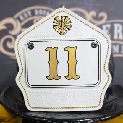 Custom leather firefighter helmet shield showing passport design for professional fire service look