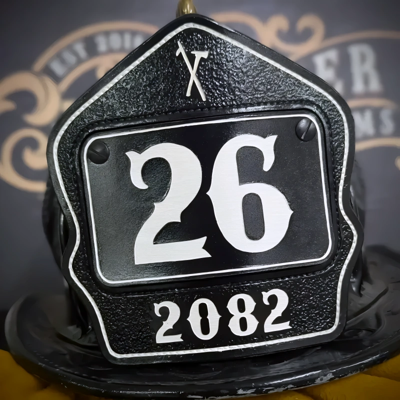 Bold firefighter helmet shield crafted in leather with passport layout for departments