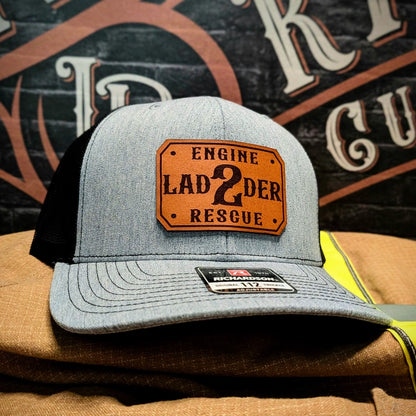 Passport leather patch hat featuring firefighter name and station number customization