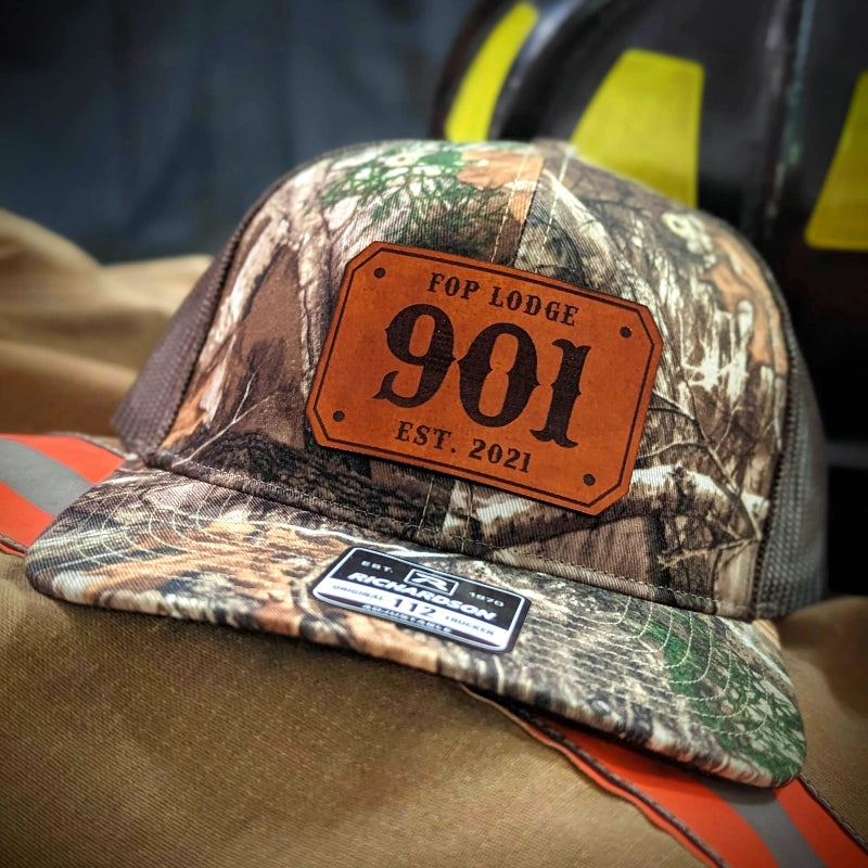 Clean professional firefighter hat featuring passport style leather patch layout