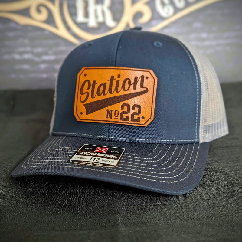 Custom firefighter lifestyle hat featuring passport leather patch front design