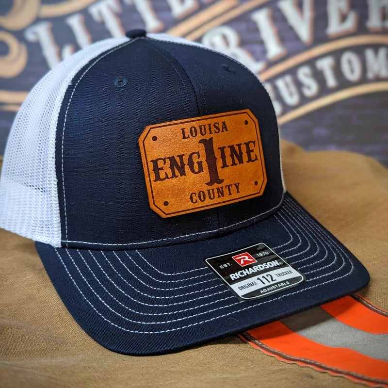 Rugged fire service hat with passport patch for clear personalization