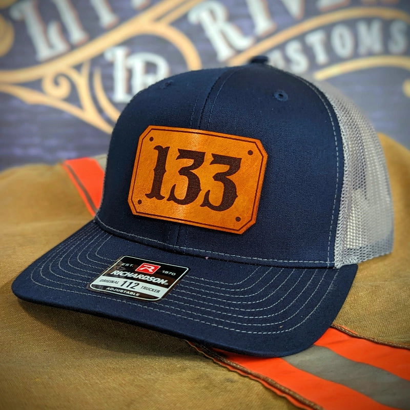 Custom fire service hat showing passport patch for department pride
