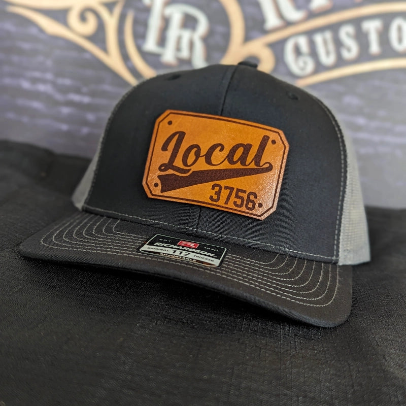 Fire service hat featuring passport leather patch personalization