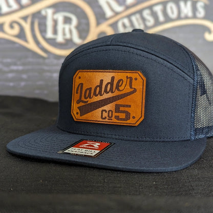 Rugged firehouse hat displaying clear passport leather patch design