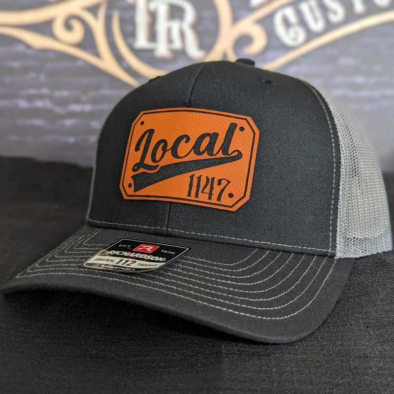 Station apparel hat with professional passport style patch layout