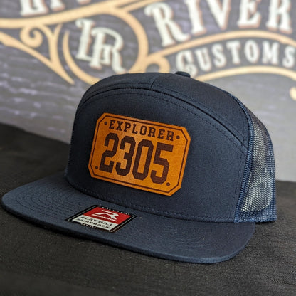 Firefighter pride hat showing passport patch with crisp lettering
