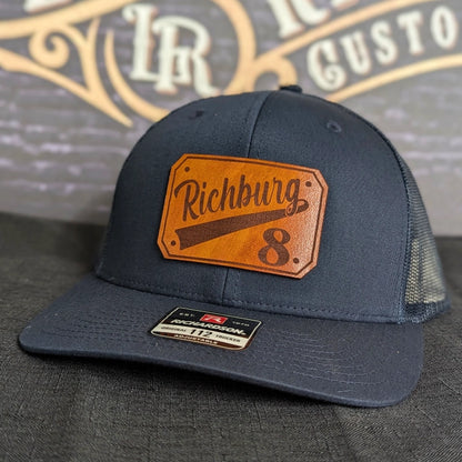 Rugged fire service hat featuring durable passport leather patch front