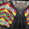Video slideshow of custom helmet shields handcrafted in leather and hand painted, featuring firefighter helmet fronts built for durability, tradition, and firehouse pride.