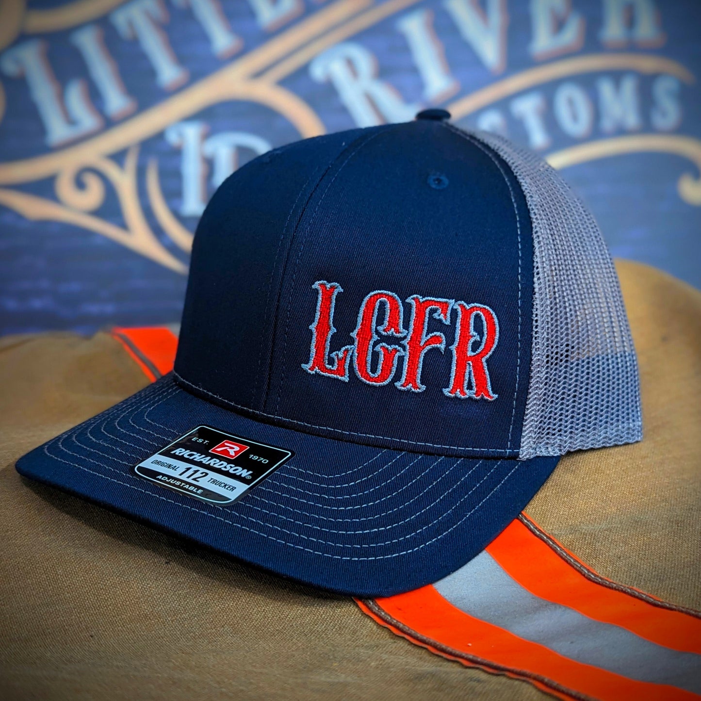 Custom embroidered firefighter hat with bold stitching, structured fit, and premium Richardson snapback design