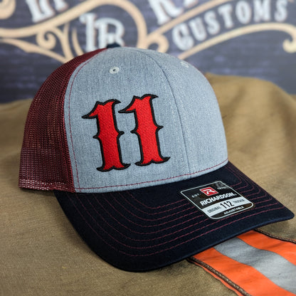 Custom embroidered firefighter hat with bold stitching, structured fit, and premium Richardson snapback design