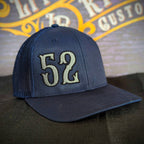 Custom embroidered firefighter hat with bold stitching, structured fit, and premium Richardson snapback design