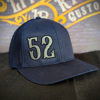 Custom embroidered firefighter hat with bold stitching, structured fit, and premium Richardson snapback design