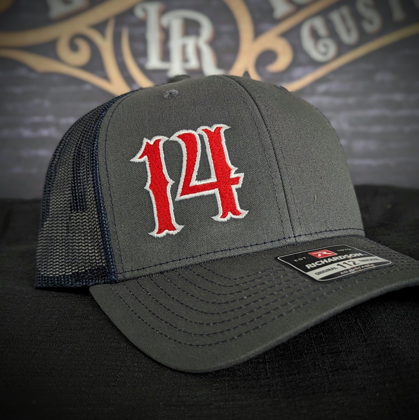 Custom embroidered firefighter hat with bold stitching, structured fit, and premium Richardson snapback design