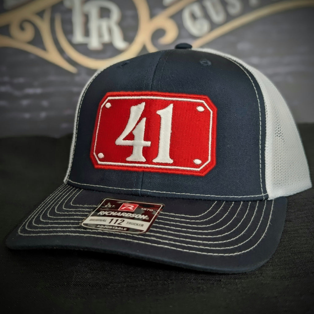 Custom embroidered firefighter hat with bold stitching, structured fit, and premium Richardson snapback design